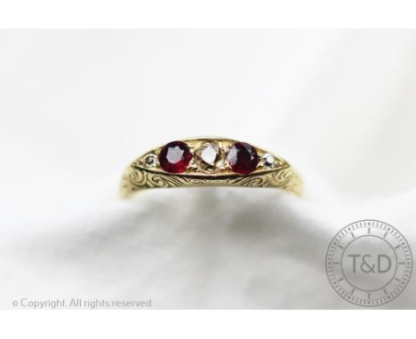 An Edwardian ruby coloured and diamond five stone ring, Birmingham 1907, the 18ct yellow gold ring with boat shaped setting s