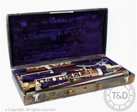 A French rosewood and nickel plated bassoon by Triebert of Paris, two pieces numbered 4802, in fitted case, the top of the ca