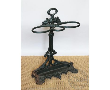 A Coalbrookdale style cast iron stick stand, 20th century, 73cm H