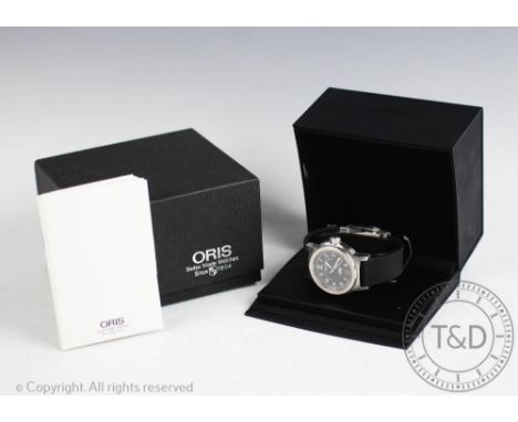 A gentleman's Oris BC3 7500 Day-Date Automatic stainless steel wristwatch, the circular black face with white Arabic numerals