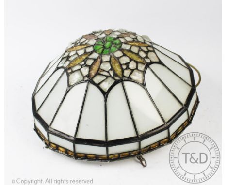 An Art Nouveau style light fitting, of rounded form set with stained glass panels, 39cm wide CONDITION REPORT: Lighting lots 