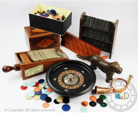 An early 19th century inlaid mahogany tea caddy, (one hinge broken), with a French mahogany card shoe 'Le Banquier', by J.A.L