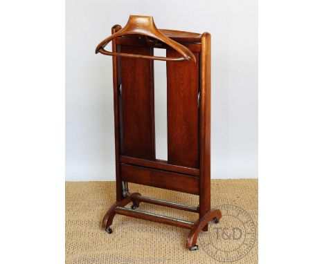 A vintage Harrods of London beech valet stand, Italian made, 101cm H 