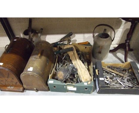 A collection of various hand tools, a manual car horn and other items.