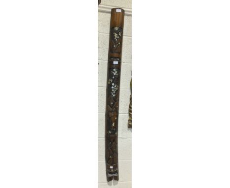 A half-section of bamboo carved with a figure, mountains and mother-of-pearl blossom, 153cm long, 11cm wide.