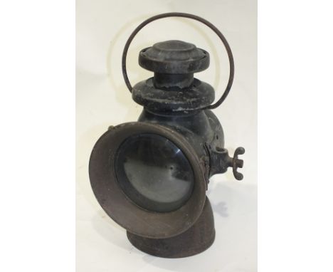 A Lucas No.742 'King of the Road' hand lamp.