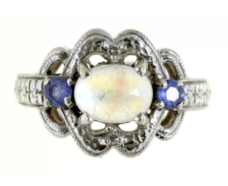 A MOONSTONE AND TANZANITE THREE STONE RING IN 14CT WHITE GOLD, 5.4G, SIZE M