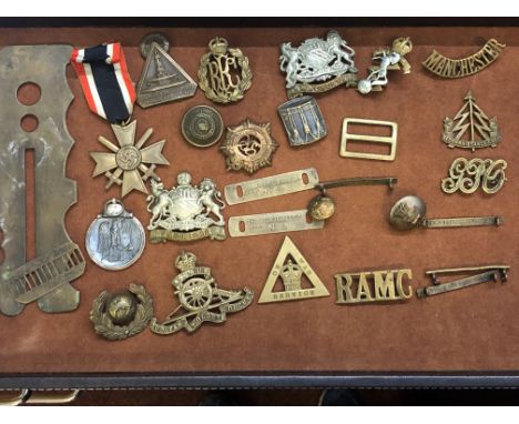 Winterschlacht Imosten 1941-42 medal, German Merit cross, various medals & buttons together with brass button cleaning stick 