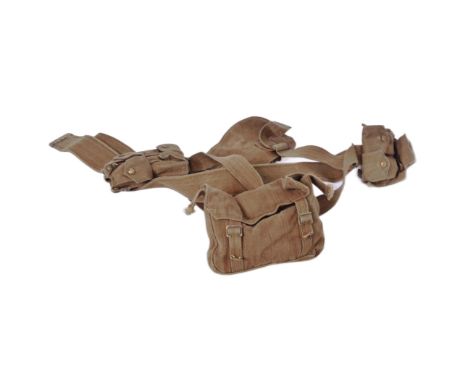 An early 20th Century British Army 1908 pattern webbing set. Khaki example with waist belt, frog, braces, cartridge carriers,