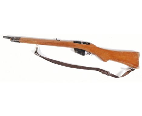 A reenactment WWI First World War British 1914 Enfield style bolt action rifle. Dog leg style stock and integrated faux magaz