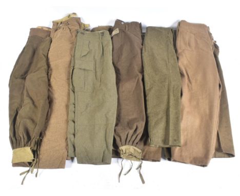 A large collection of post War British battle dress trousers. Khaki wool serge with front pockets and labels with broad arrow