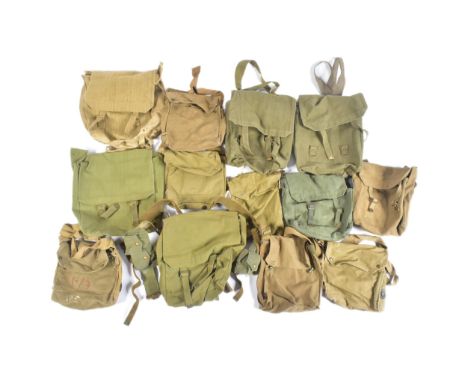 A large collection of British Army webbing pouches / haversacks along with some light weight canvas examples. Some with WWII 