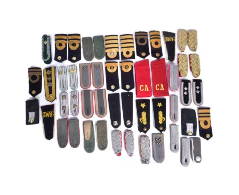 A collection of assorted British Military (and other) shoulder boards and shoulder insignia to include Army, Navy and Air For