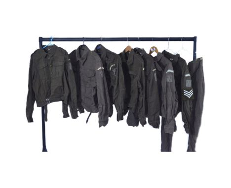 A collection of reenactment Home Guard uniform tunics with Dads Army CP 1 patches to the left sleeve. Assorted men sizes 40, 