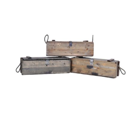 A collection of x3 post war wooden ammunition boxes with rope carry handles and metal fastenings. Each measuring 24x75x24cm.
