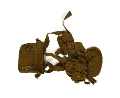 An early 20th Century British Army 1908 pattern webbing set. Desert tan example with waist belt, frog, braces, cartridge carr