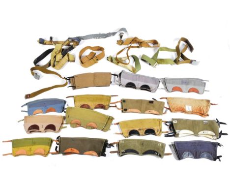 A large collection of British Army soldiers canvas and webbing gaiters. Assorted examples with leather straps and buckles, ap