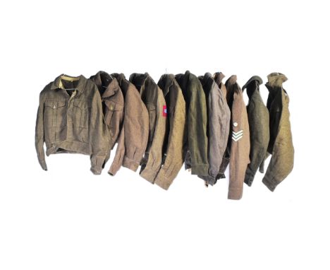 A large collection of post war 1950s British Military uniform tunics / battledress blouses. Largely unbadged examples, some w