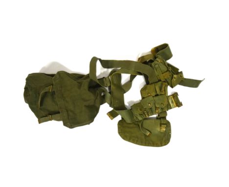 An early 20th century British Army 1908 pattern webbing set. Khaki example with waist belt, frog, braces, cartridge carriers,