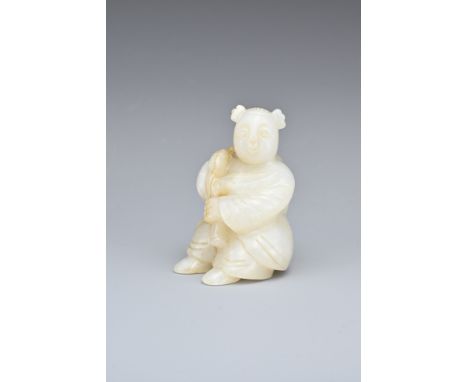 A CHINESE PALE CELADON JADE CARVING OF A BOY. Seated holding a leafy stem with a ruyi head over his shoulder. 6cm tall.Overal