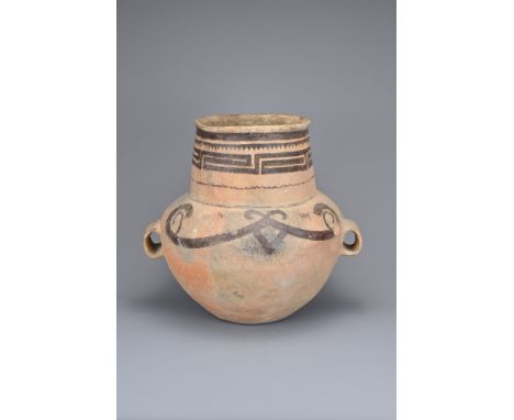 A LARGE CHINESE NEOLITHIC / BRONZE AGE PAINTED POTTERY JAR, XINDIAN. Bulbous body, two wide loop handles at the waist with a 