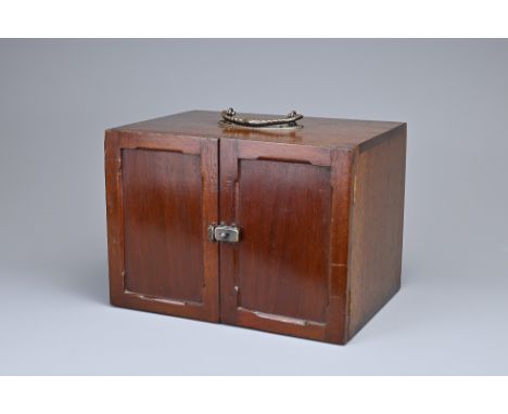 A CHINESE BOXED MAHJONG SET, EARLY 20TH CENTURY. Bone and bamboo pieces within a hardwood carrying box with two doors. Comple