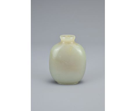 A CHINESE PALE CELADON JADE SNUFF BOTTLE. Of flattened ovoid form on short foot rim. 5.9cm height. Approx. 80 grams.Minor sur