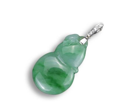 AN 18KT WHITE GOLD, DIAMOND AND JADEITE DOUBLE GOURD SHAPED PENDANT. Carved with a bug to the top, suspended from a white gol