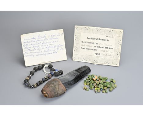 A GROUP OF ANCIENT GLASS AND STONE ITEMS. Comprising a Sumerian beaded necklace with 'Certificate of Authenticity' from Museu