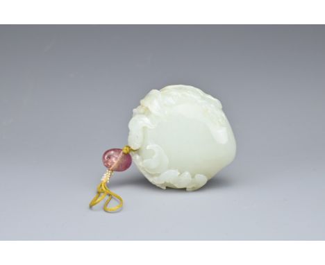 A CHINESE PALE CELADON JADE PEACH AND BAT GROUP, QING DYNASTY. The peach carved in relief with a leafy stem with two bats and