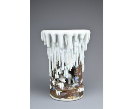 A RARE JAPANESE PORCELAIN VASE, MIYAGAWA KOZAN, C1900-1910.Makuzu ware in the form of two polar bears in a cave with thick dr