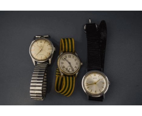 A collection of three gentlemens' vintage mechanical wrist watches, Cyma, Vertex and Alpina