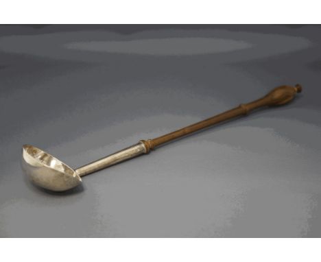 A George II silver punch ladle, makers mark GD in script, London 1740, the bowl and stem to a wooden turned handle, 34.5 cm l