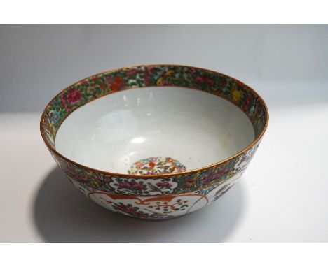 A Canton enamel bowl, with typical decoration of birds and butterflies among peonies, 26.5cm diameter