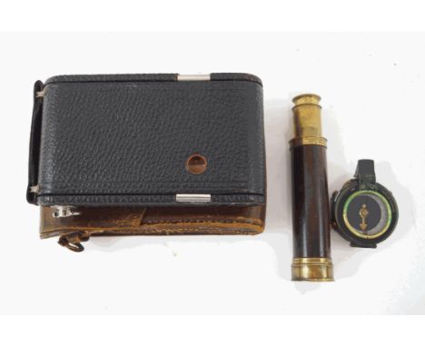 A Victorian three drawer pocket telescope by Dolland of London, a WWI field compass, Verner's pattern, in leather case, and  