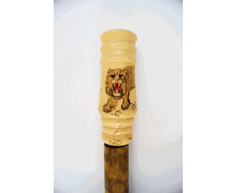 An early 20th century bamboo sword stick, the handle carved with a fierce lion