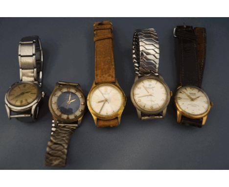 A collection of five vintage gentlemen's mechanical wrist watches