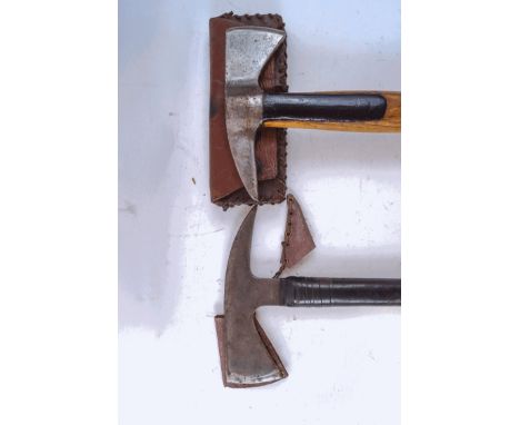 A Chillingham Artax fireman's axe and another fireman's axe