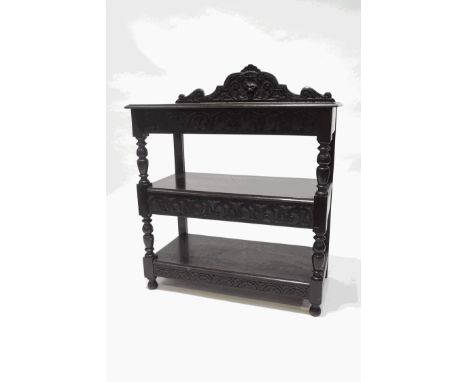 A 17th century style oak three tier buffet, 128cm high x 107cm wide x 53cm deep