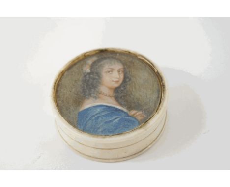 An 18th century ivory circular box, with inset portrait of a lady wearing a blue dress, 6cm diameter