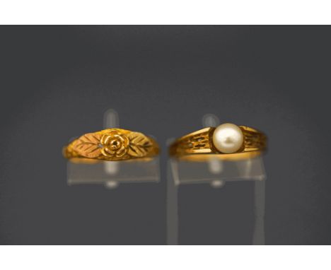 A 9 carat gold single stone cultured pearl ring; and a three colour ring, stamped '10K'; 4.8 g gross