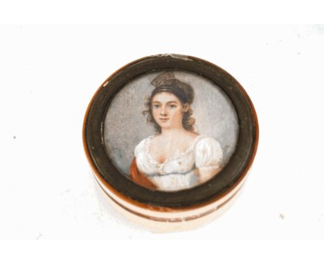 An early 19th century ivory snuff box, the lid with inset painted miniature of a young lady wearing a white dress, 6.5cm diam