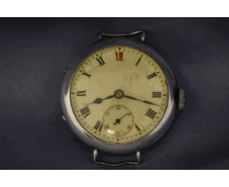 A silver wrist watch, London 1926 import mark, unsigned circular enamel dial with black Roman numerals, red VII, unsigned 15 