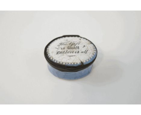 An 18th century enamel patch box, the lid with motto 'The Gift is small but Love is all', the base blue, and another smaller 