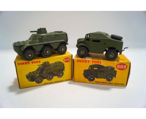 A Dinky 676 Armoured personnel carrier, boxed and a 688 Field Artillery tractor, boxed