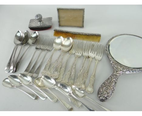 VICTORIAN SILVER EMBOSSED BACK HAND MIRROR together with silver mounted comb, blotter, and a assorted silver plates spoons an