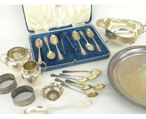 ASSORTED SILVER ITEMS to include a modern Walker &amp; Hall circular waiter, 20cms diameter, a similar cut edged sauce boat, 