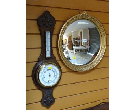 GILT FRAMED CONVEX WALL MIRROR and a carved oak banjo barometer