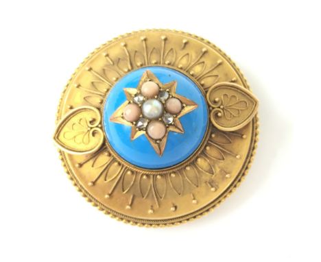 VICTORIAN GOLD TARGET BROOCH
A large Victorian yellow metal (probably 15ct gold) brooch set with Diamonds, Coral, a single Pe