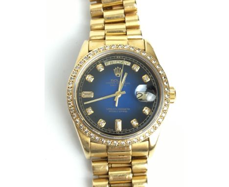 A GENTLEMANS 18K GOLD & DIAMOND ROLEX OYSTER PERPETUAL DAYDATE AUTOMATIC WRIST WATCH
 •Midnight blue toned dial with diamond 